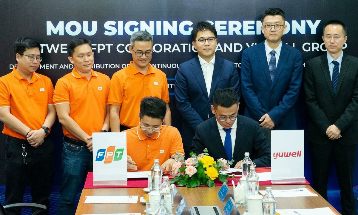 FPT và Yuwell ký hợp tác phân phối máy đo đường huyết 3P